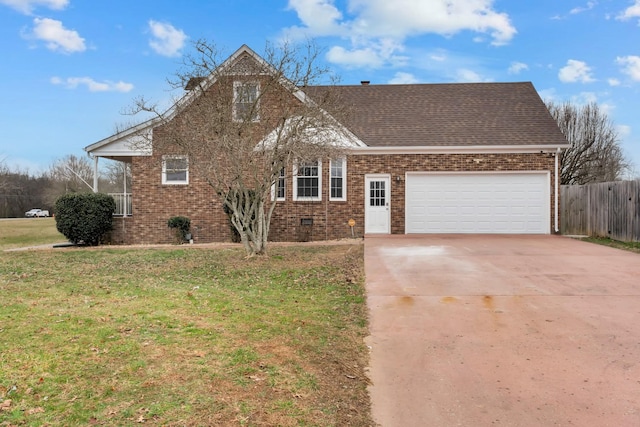 view of front facade with a front lawn and a garage