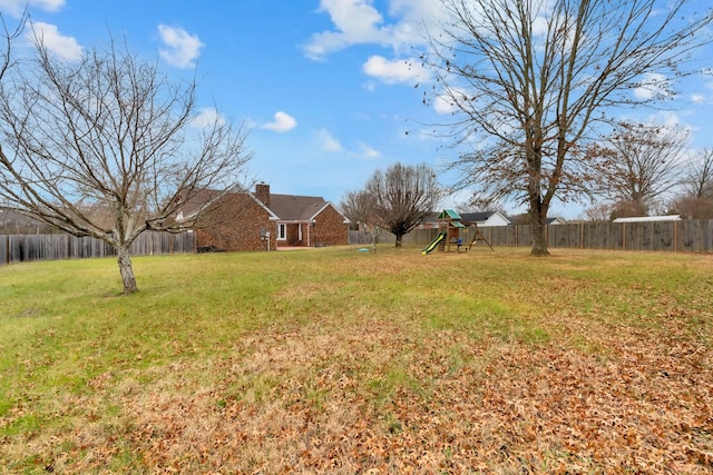 view of yard featuring a playground