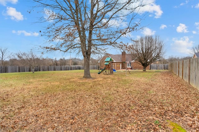 view of yard with a playground