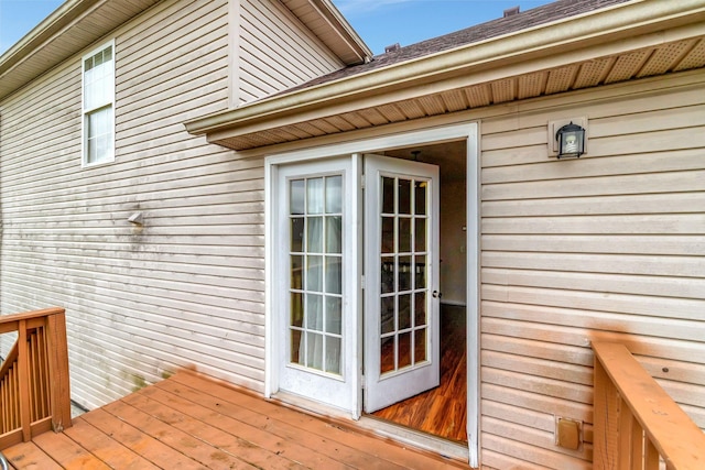 entrance to property with a deck