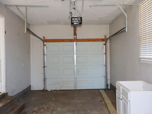 garage featuring a garage door opener