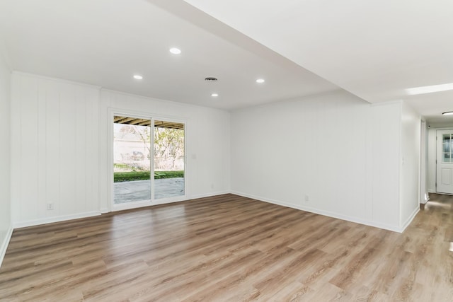 unfurnished room featuring light hardwood / wood-style flooring