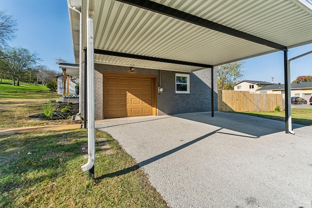 view of patio with a garage and a carport