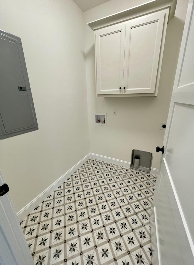 58 Union Hill Rd, Loretto, TN 38469 - laundry area with cabinet space, electric panel, and tile patterned floors
