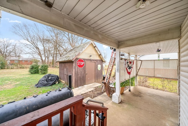 view of patio / terrace featuring a shed