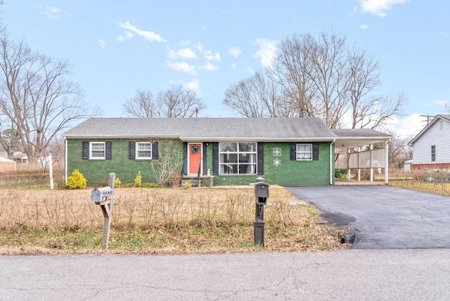 single story home with a carport