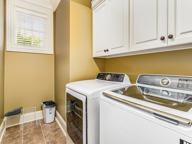 laundry area with cabinets and independent washer and dryer