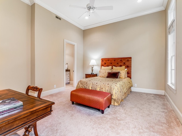 bedroom featuring carpet, ceiling fan, and crown molding