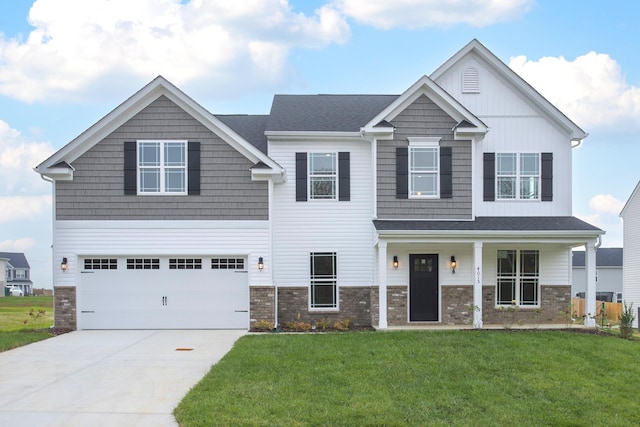 craftsman-style house with a front yard and a garage