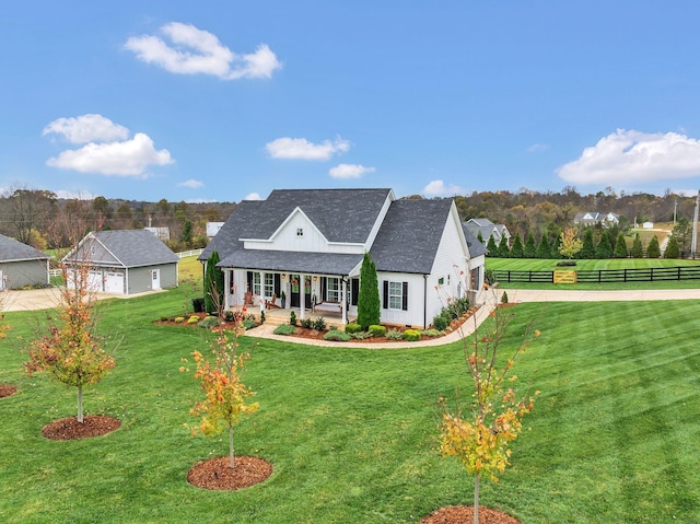 view of front of property featuring covered porch and a front lawn