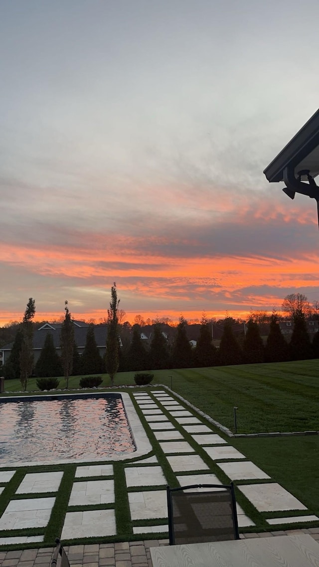 patio terrace at dusk with a yard