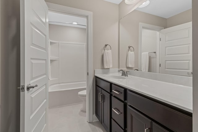 full bathroom with tile patterned flooring, vanity, bathtub / shower combination, and toilet