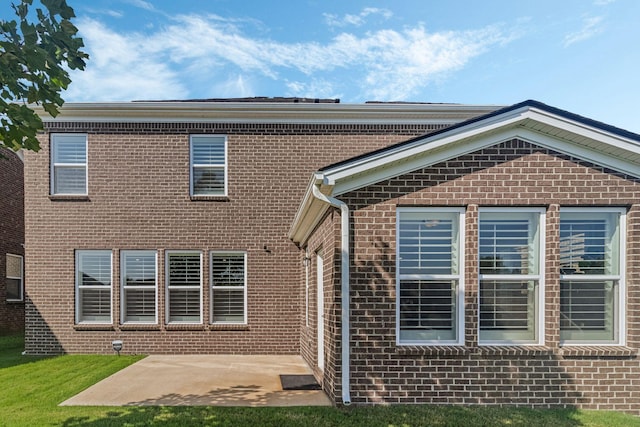 back of house featuring a patio