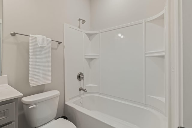 full bathroom with shower / tub combination, vanity, and toilet