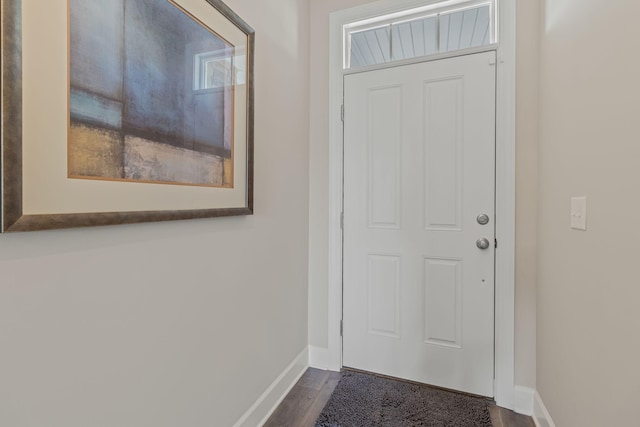 doorway with dark hardwood / wood-style flooring