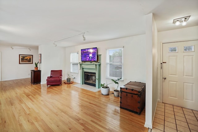 3417 Pleasant Valley Rd, Nashville, TN 37204 - living room featuring light wood-type flooring and rail lighting