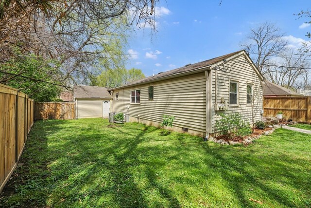 3417 Pleasant Valley Rd, Nashville, TN 37204 - rear view of property featuring a yard and a storage unit