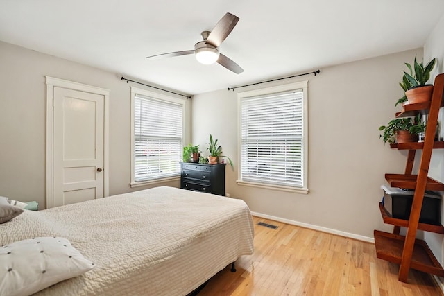 3417 Pleasant Valley Rd, Nashville, TN 37204 - bedroom with multiple windows, light wood-type flooring, and ceiling fan