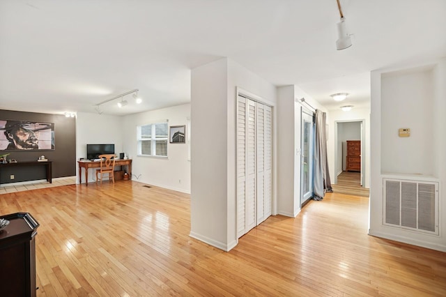 3417 Pleasant Valley Rd, Nashville, TN 37204 - hallway with light wood-type flooring and track lighting