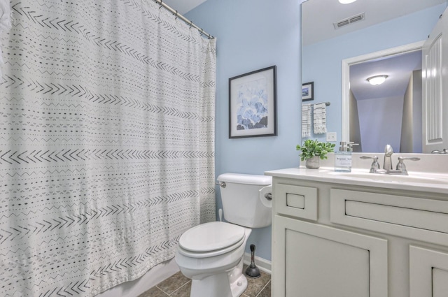 bathroom featuring tile patterned flooring, vanity, a shower with shower curtain, and toilet