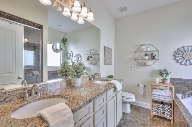 full bathroom with vanity, toilet, and independent shower and bath