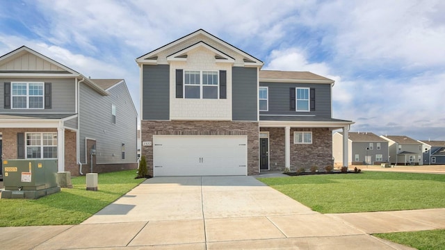 craftsman inspired home with a garage and a front lawn