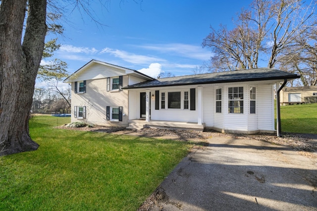 split level home with a front yard