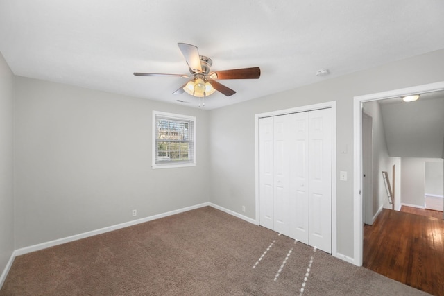 unfurnished bedroom featuring carpet flooring, a closet, and ceiling fan