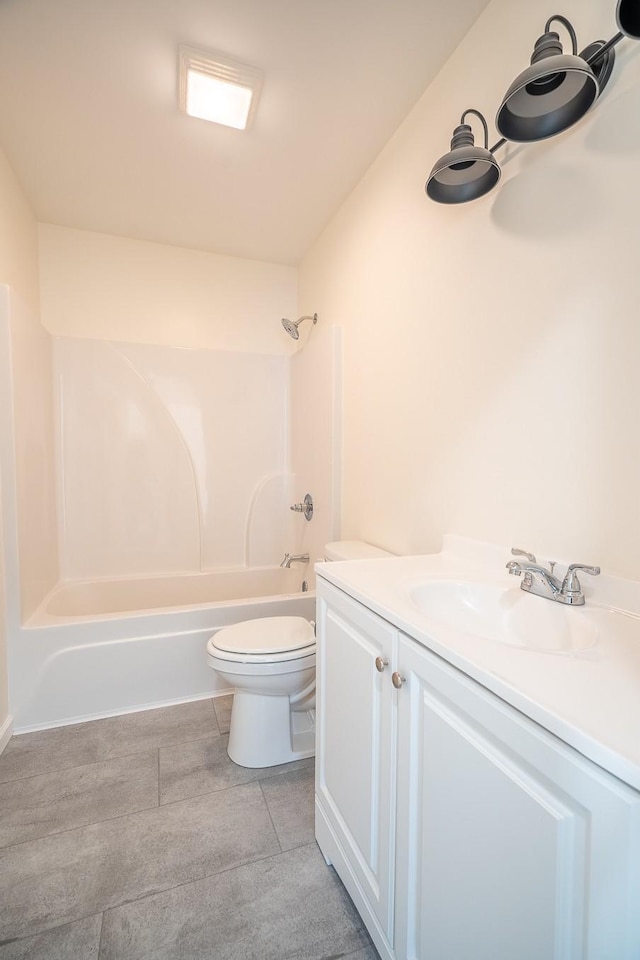 full bathroom featuring vanity, shower / bath combination, and toilet