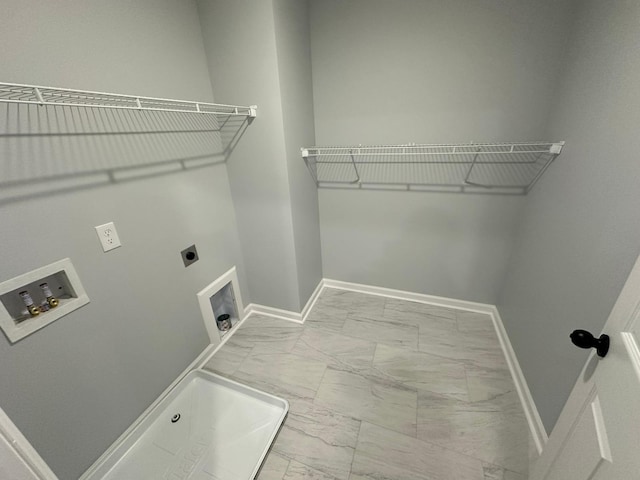 laundry room with washer hookup and electric dryer hookup