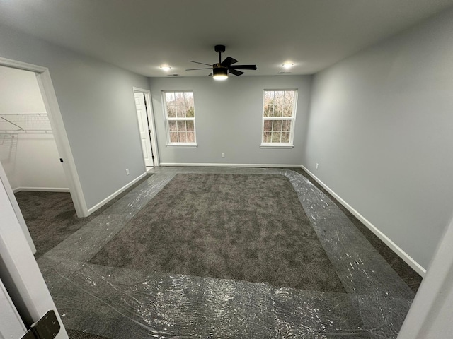 spare room with ceiling fan