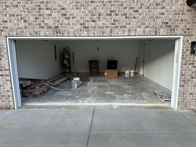 garage featuring water heater