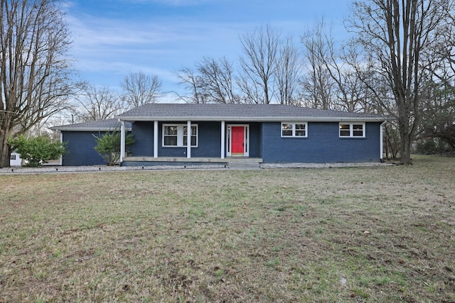 ranch-style home with a porch and a front lawn