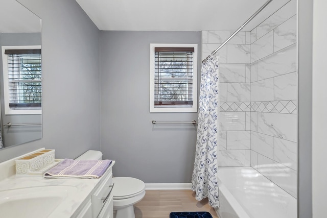 full bathroom with vanity, shower / bathtub combination with curtain, and toilet