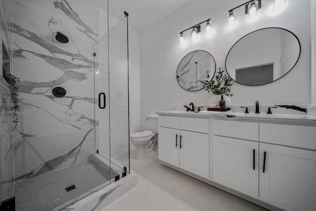 bathroom with vanity, an enclosed shower, and toilet