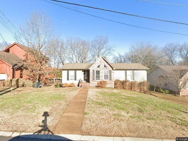 view of front of home with a front lawn