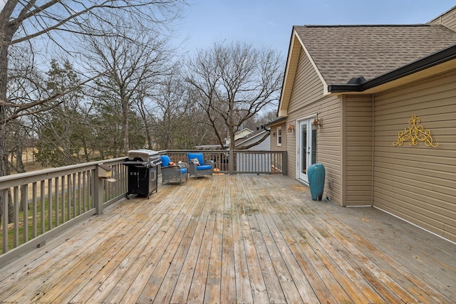 wooden terrace featuring an outdoor living space