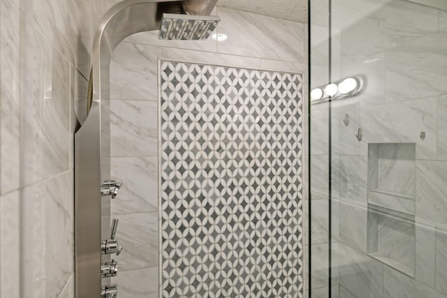 details featuring a tile shower