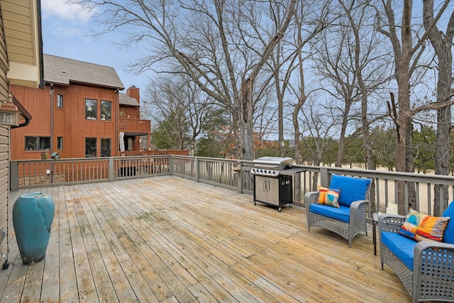 wooden deck featuring an outdoor hangout area