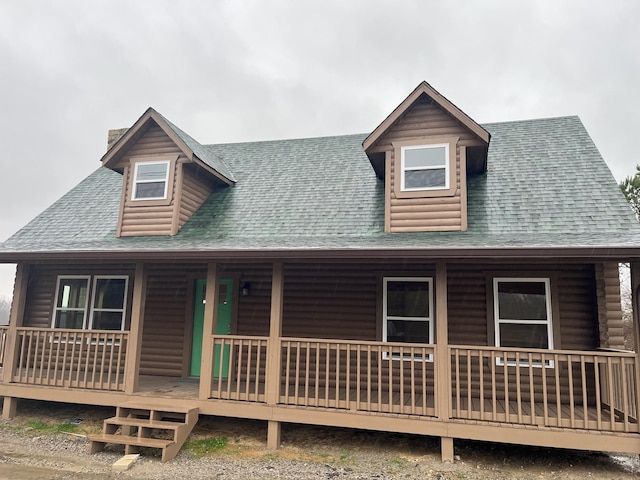 log home with a porch