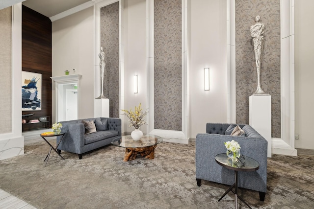 living room featuring a towering ceiling