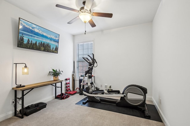 workout room with carpet floors and ceiling fan