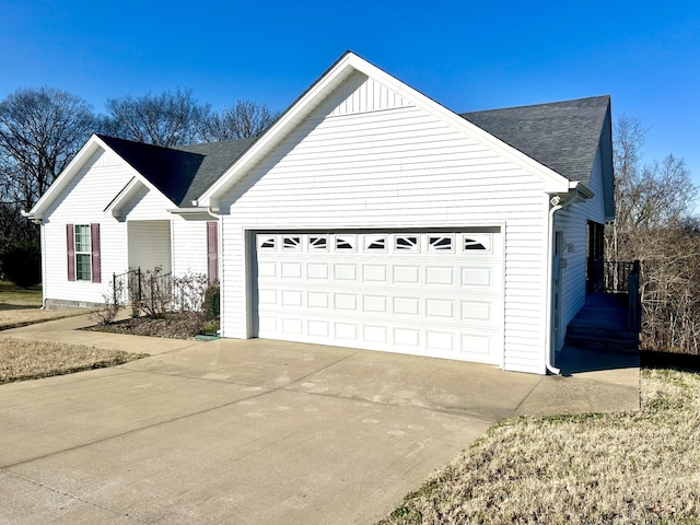 ranch-style house featuring a garage