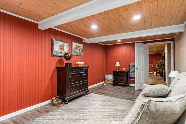 living area featuring beam ceiling, crown molding, wooden ceiling, and dark hardwood / wood-style floors