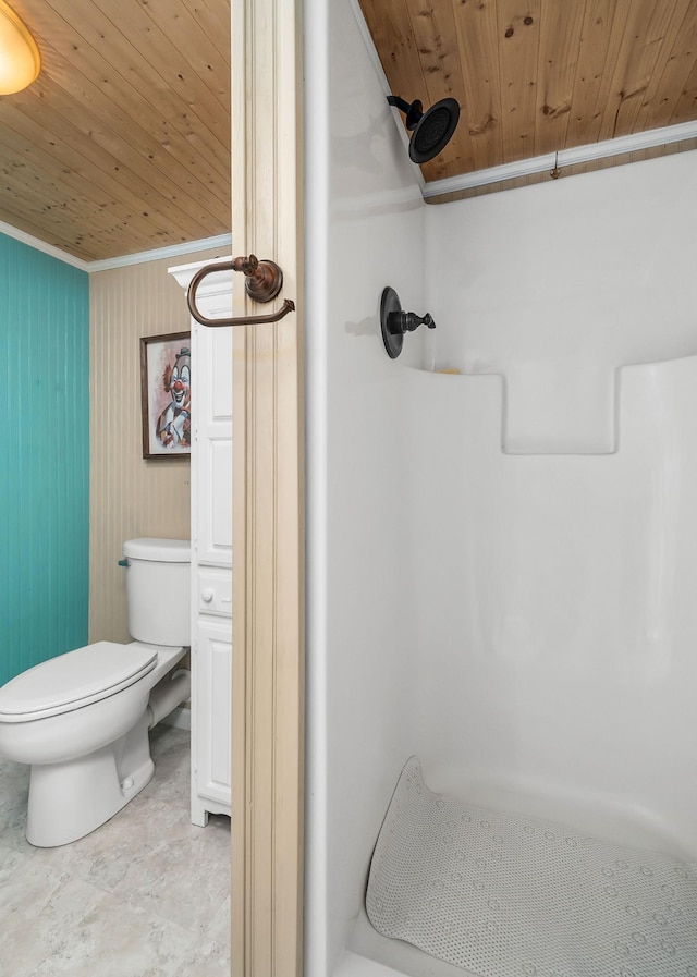 bathroom featuring crown molding, a shower, wooden ceiling, toilet, and wood walls