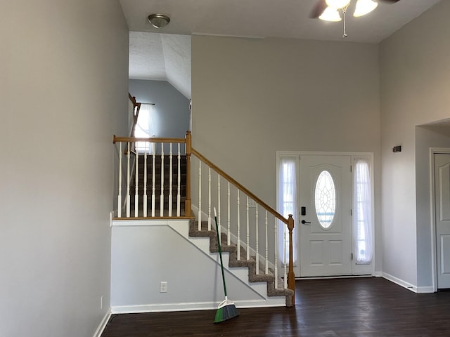 entrance foyer featuring ceiling fan and dark hardwood / wood-style floors