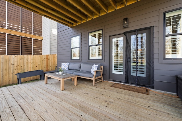 wooden deck with outdoor lounge area