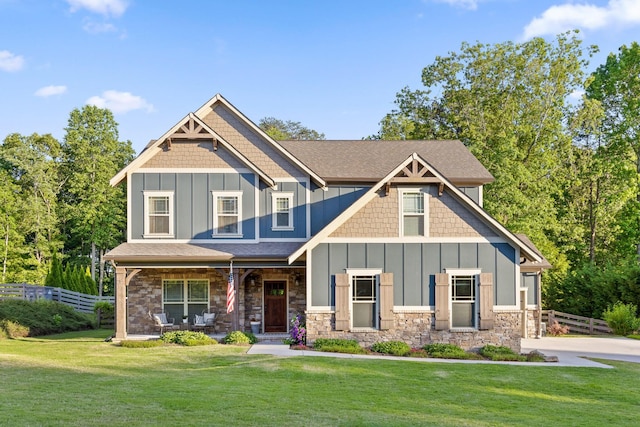 craftsman inspired home with a front yard