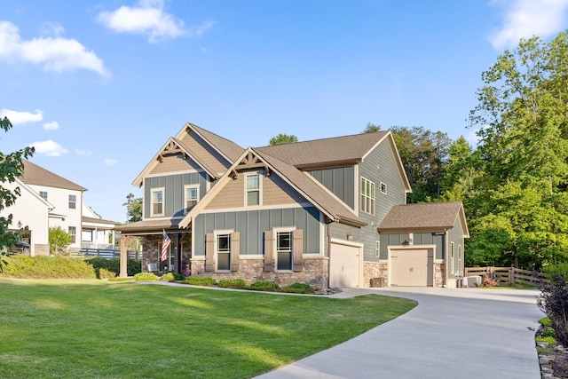 craftsman house with covered porch and a front yard