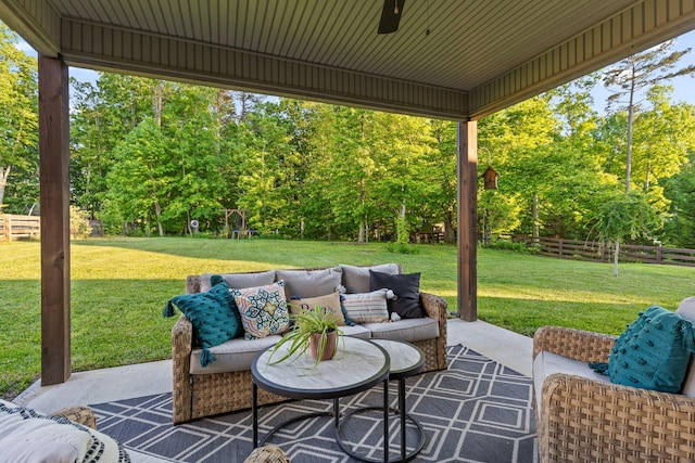 view of patio with ceiling fan and an outdoor hangout area